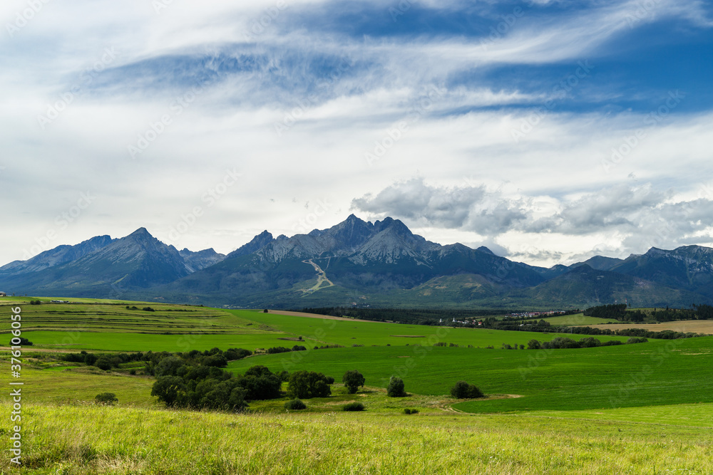 Fototapeta premium Green meadows under High Tatras mountains, Slovakia