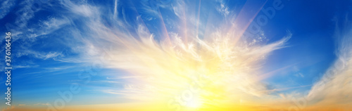Photography Panorama of sunset dramatic sky with bright sun