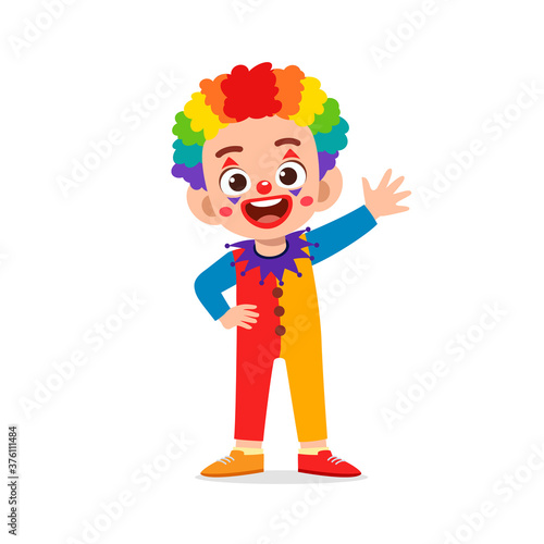 happy cute little kid boy and girl celebrate halloween wears clown costume