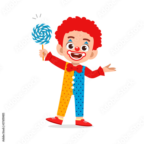 happy cute little kid boy and girl celebrate halloween wears clown costume
