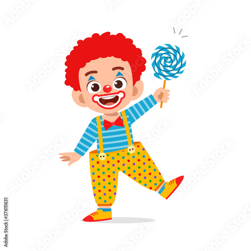 happy cute little kid boy and girl celebrate halloween wears clown costume