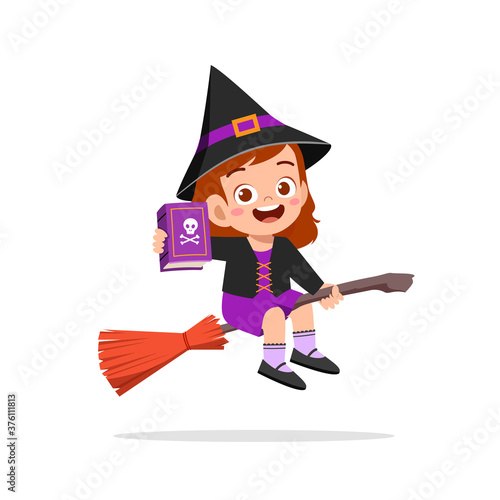 happy cute little kid boy and girl celebrate halloween wears witch costume