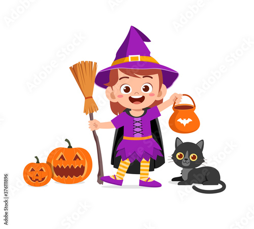 happy cute little kid boy and girl celebrate halloween wears witch costume