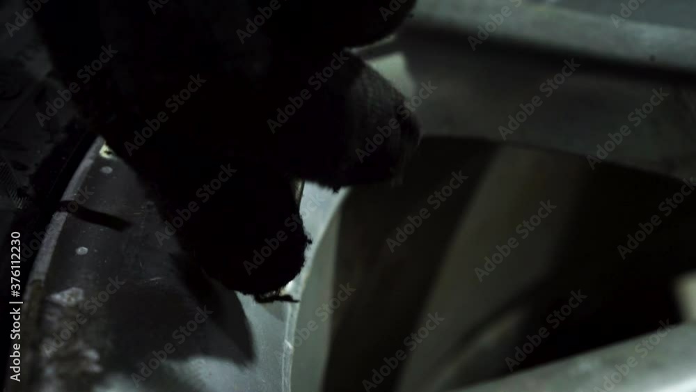 close up video with tire and inflate air with special device at service station. Footage. Process of repair car tire on steel disk. close up video with tire and inflate air with special device at service station. Footage. Process of repair car tire on steel disk.