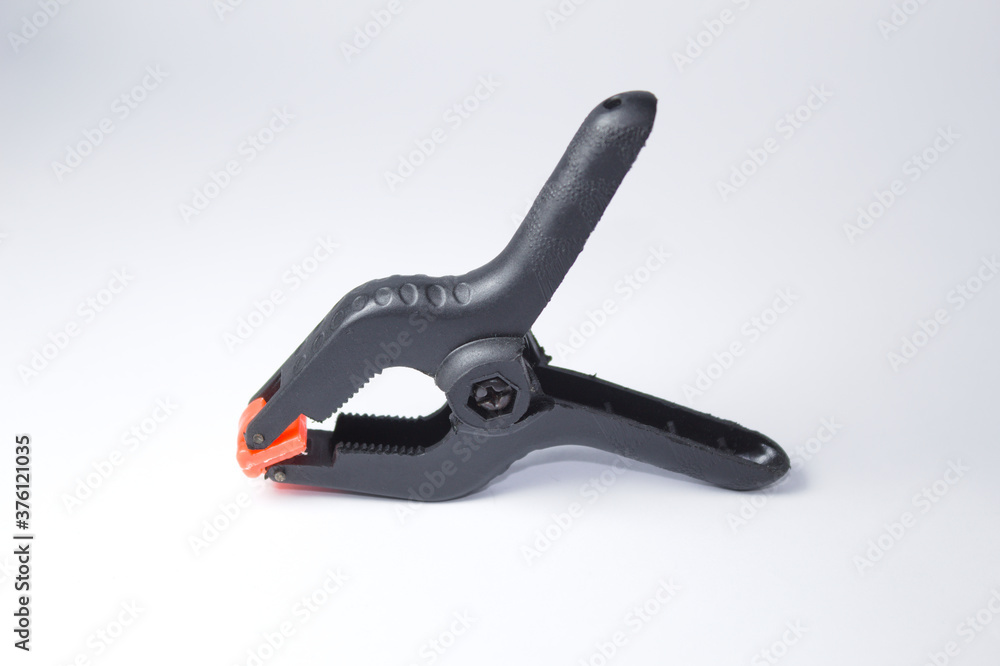 Prendedor para segurar objetos ou ferramentas Prendedor para segurar objetos ou ferramentas
