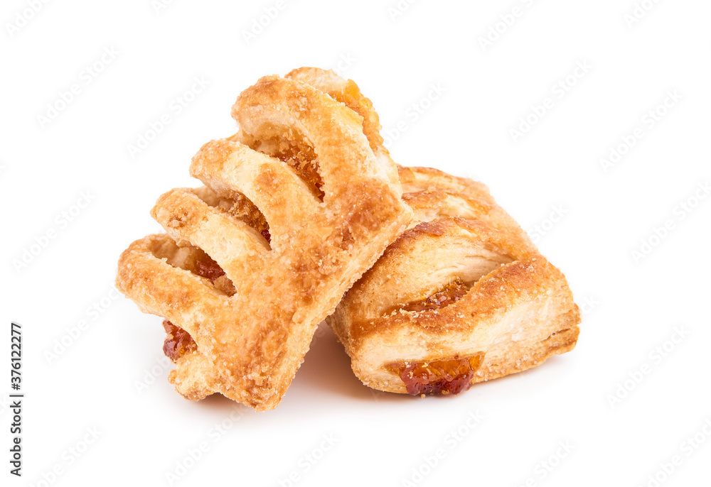 Fresh puff on the white background. Cookies from puff pastry with colored jam. Homemade baking. Dessert for tea. Croissant Fresh puff on the white background. Cookies from puff pastry with colored jam. Homemade baking. Dessert for tea. Croissant