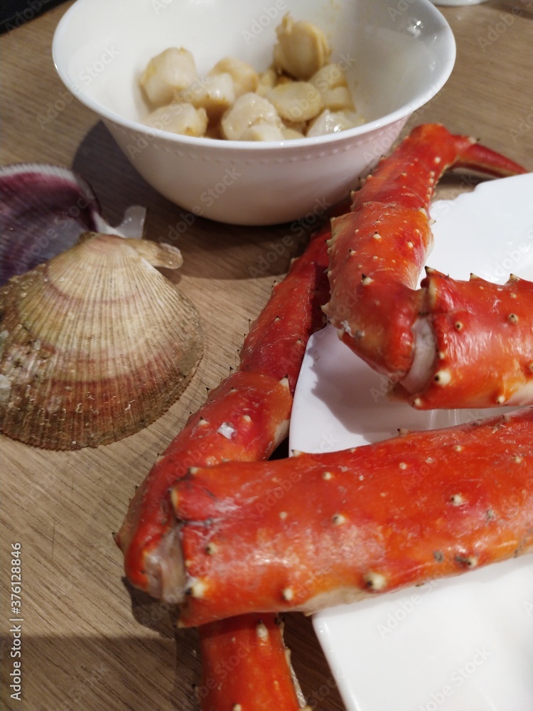 Cooked seafood crab scallops on the kitchen table Cooked seafood crab scallops on the kitchen table