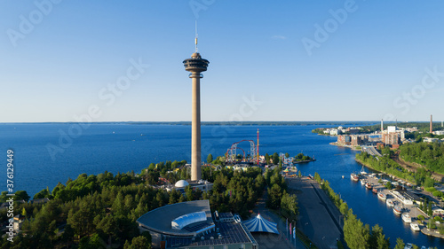 Aerial view of beautiful city on the lake shore in Finland at summer. Sunset blue sky. Europe. photo
