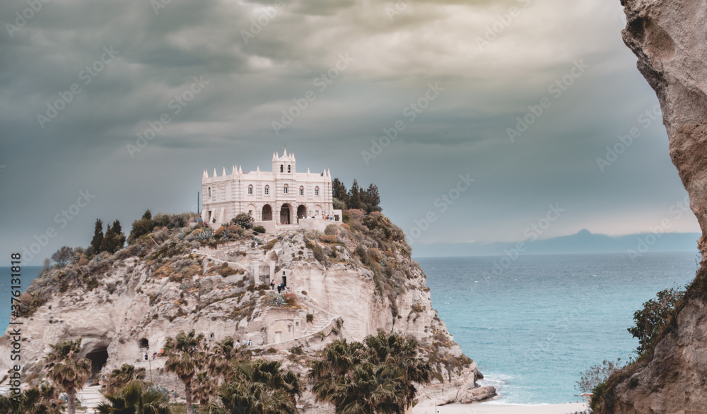 Santa Maria dell'Isola church with cloudy sky in Tropea, Italy