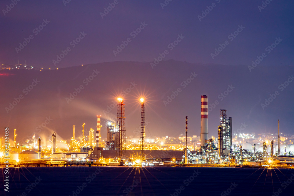 Oil refinery factory on the sea in Izmit, Turkey. Petrochemical plant structure on manufacturing oil refinery. Tupras Izmit petroleum refinery. Tupras is Turkey's largest oil refinery.