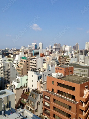 Cityscape of Osaka crowded with many new and high buildings