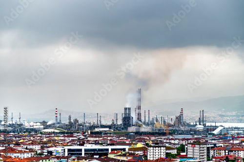 Oil refinery factory on the sea in Izmit, Turkey. Petrochemical plant structure on manufacturing oil refinery. Tupras Izmit petroleum refinery. Tupras is Turkey's largest oil refinery. photo