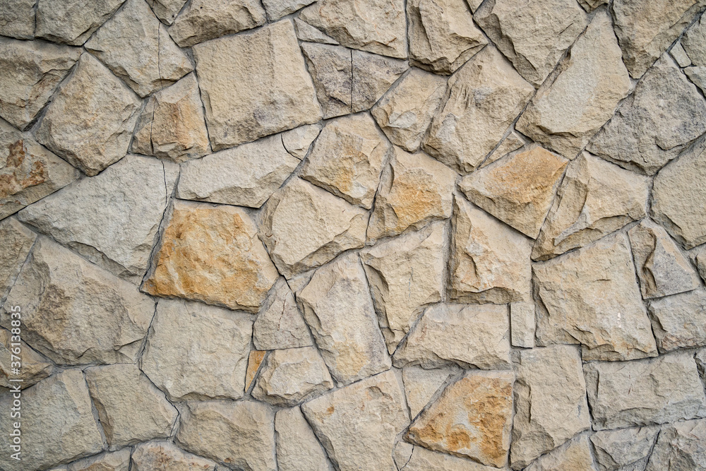 Obraz premium Modern stone brick wall background. Stone texture.