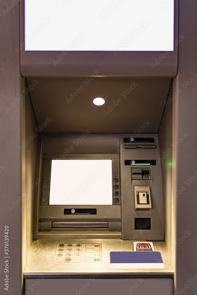 Built-in ATM machine with blank display on grey background. Built-in ATM machine with blank display on grey background.