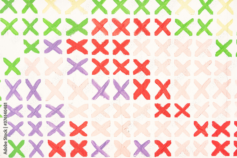 Colorful repetitive cross marks on white background