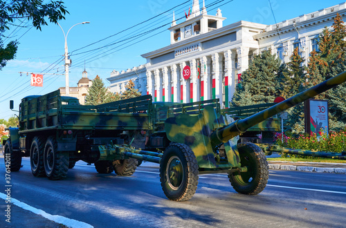 military parade in the city, ordered military equipment, tanks, guns and other weapons in the street for celebration