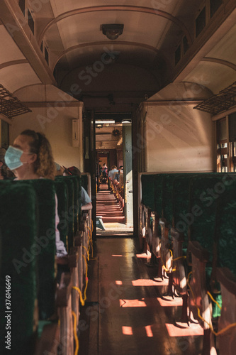 people in vintage train car