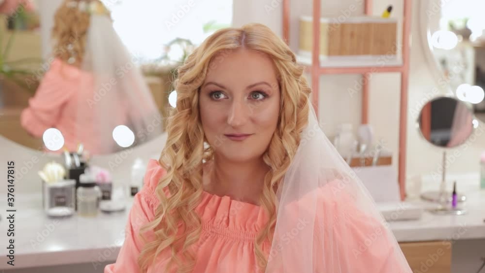 Woman bride in beauty salon posing at camera. Woman bride in beauty salon posing at camera.