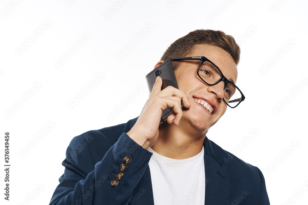 Business man in a jacket with glasses emotions official manager light background studio Business man in a jacket with glasses emotions official manager light background studio