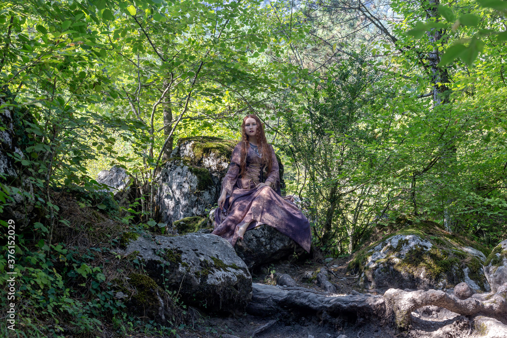 The elf women during Halloween in the forest. The elf women during Halloween in the forest.