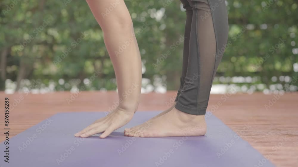 4k selective focus young woman practice yoga at home 4k selective focus young woman practice yoga at home