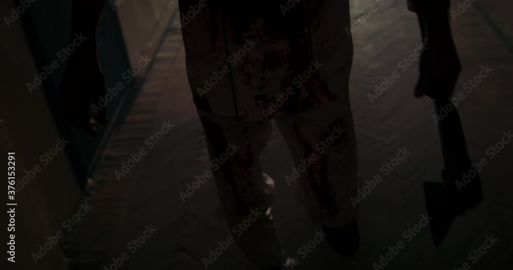 Scary senior moustached maniac looking for prey in old house. Bloodthirsty butcher in stained apron swinging his axe - halloween thematic party 4k footage Scary senior moustached maniac looking for prey in old house. Bloodthirsty butcher in stained apron swinging his axe - halloween thematic party 4k footage