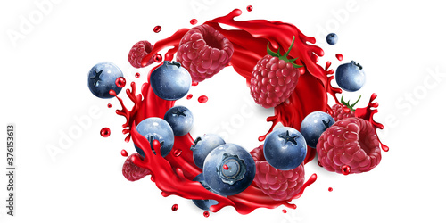 Blueberries and raspberries and fruit juice splash.