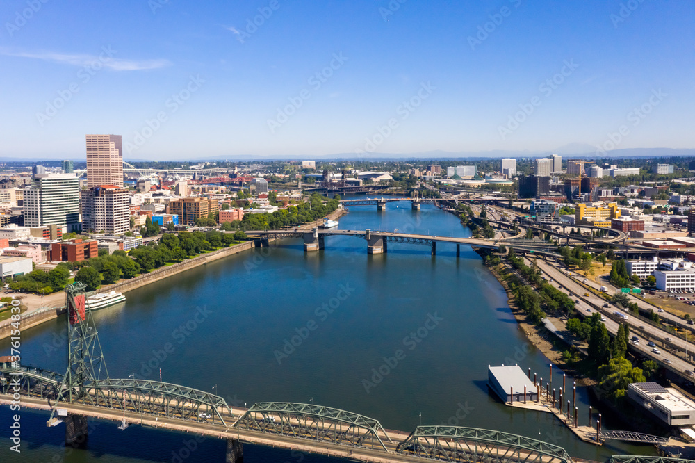 Aerial view of Downtown Portland Oregon with many bridges over river