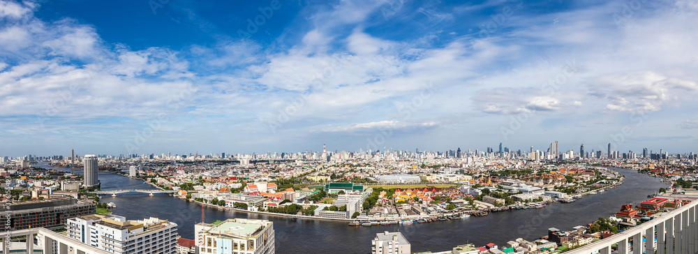 Panorama aerial view of Bangkok skyline and skyscraper waterfront of the Chao Phraya River