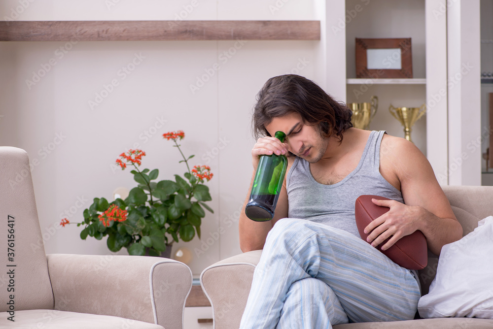 Male ex-champion american football player suffering from alcohol Male ex-champion american football player suffering from alcohol