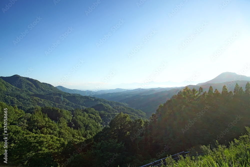 blue sky above high mountain landscape in daytime, Japanese alps, Hakuba, Japan