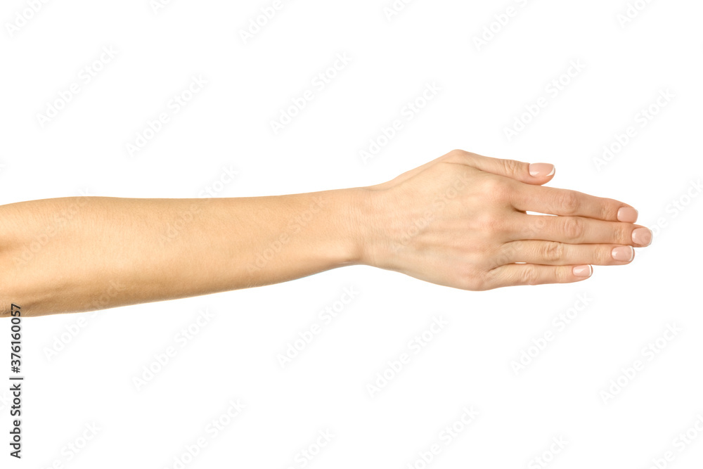 Giving hand for handshake. Woman hand gesturing isolated on white Giving hand for handshake. Woman hand gesturing isolated on white