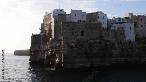 Video of the sunrise of Polignano a mare, Puglia, Italy. Cliff overlooking the sea photo