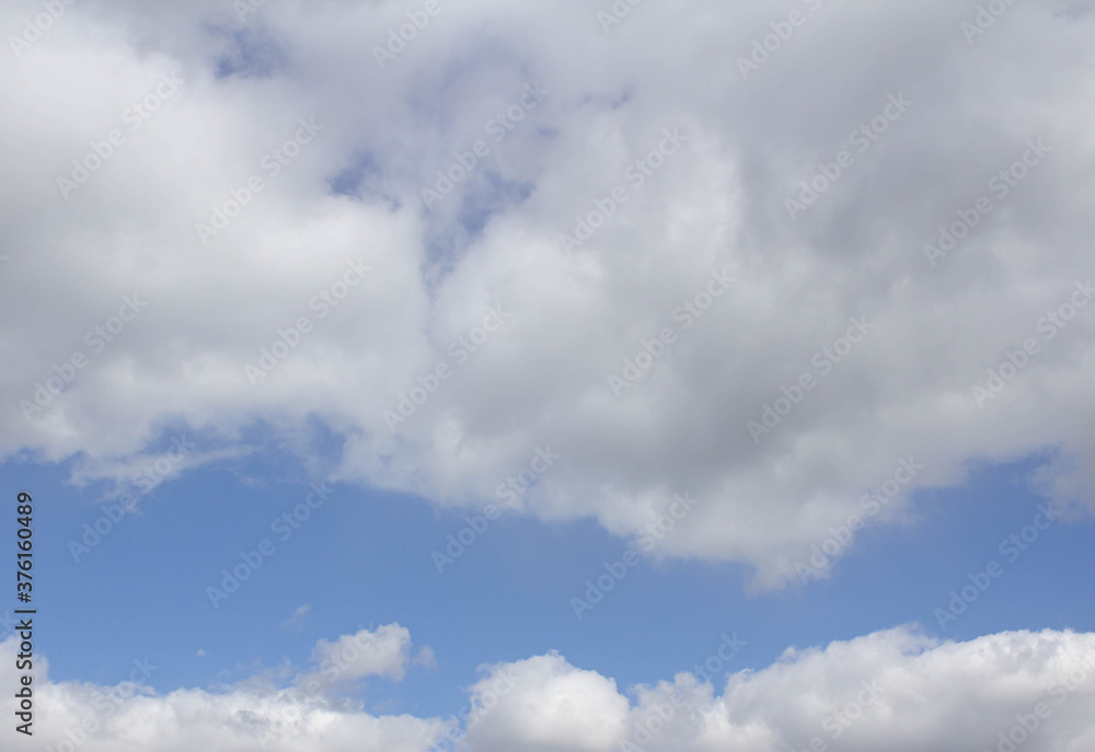 Blue sky and clouds in the daytime. Nature background