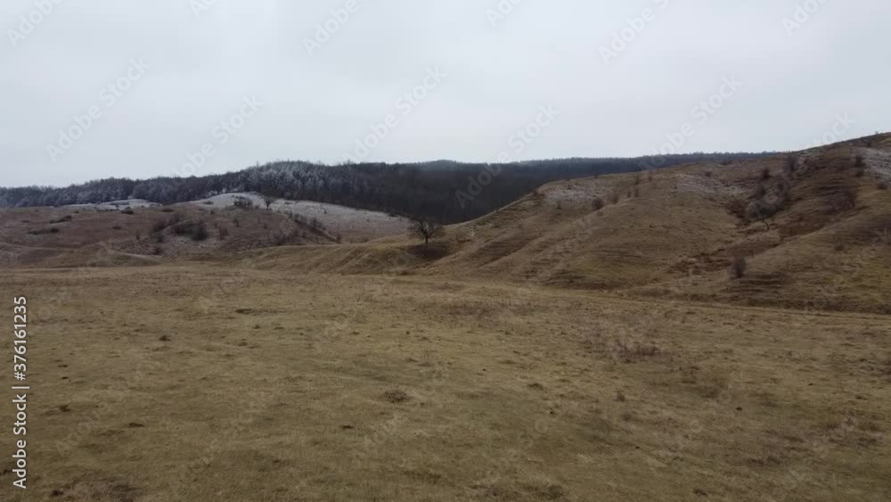 Aerial view of a hill on winter season Aerial view of a hill on winter season