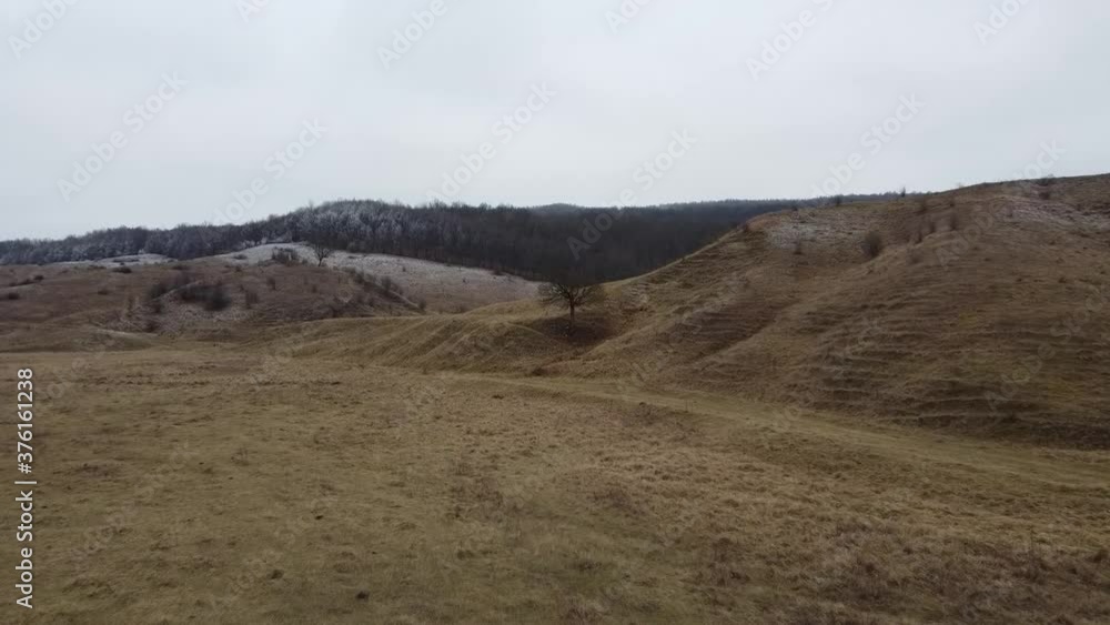 Aerial view of a hill on winter season Aerial view of a hill on winter season