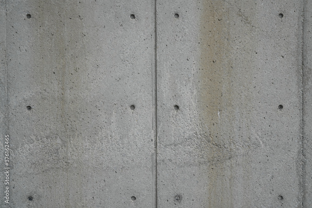 concrete wall background with rusty colors and old aging and degrading feel concrete wall background with rusty colors and old aging and degrading feel