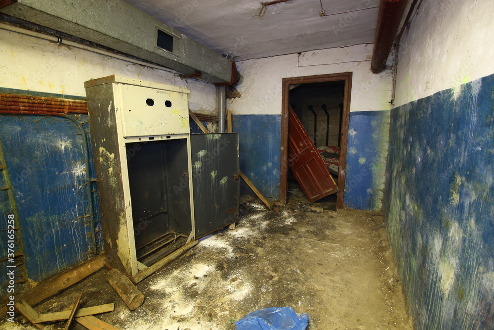 rooms of an abandoned bomb shelter with items rooms of an abandoned bomb shelter with items
