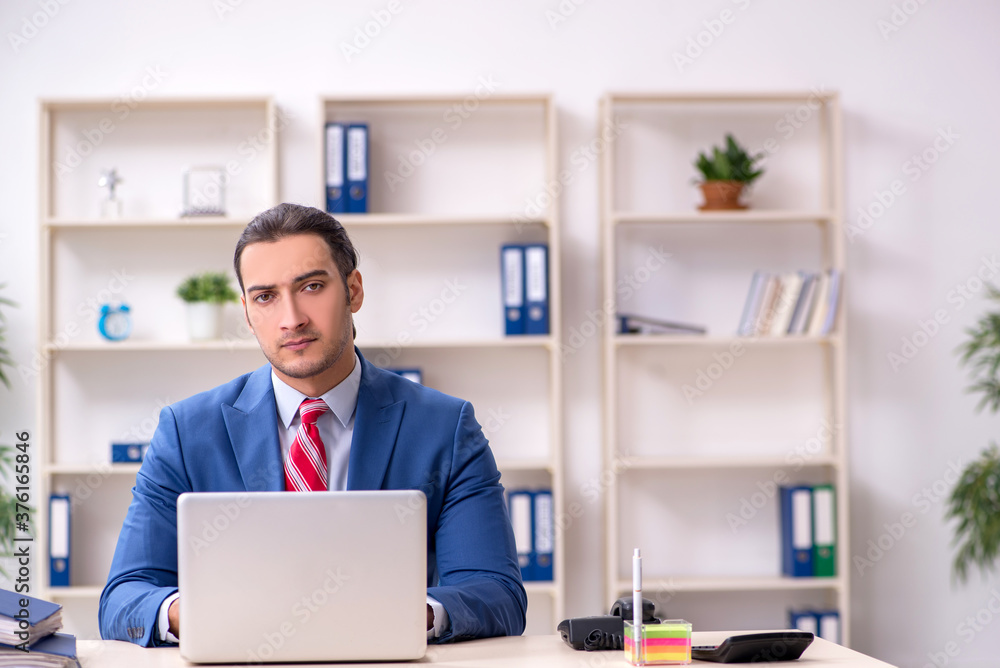 Funny employee clown working in the office Funny employee clown working in the office