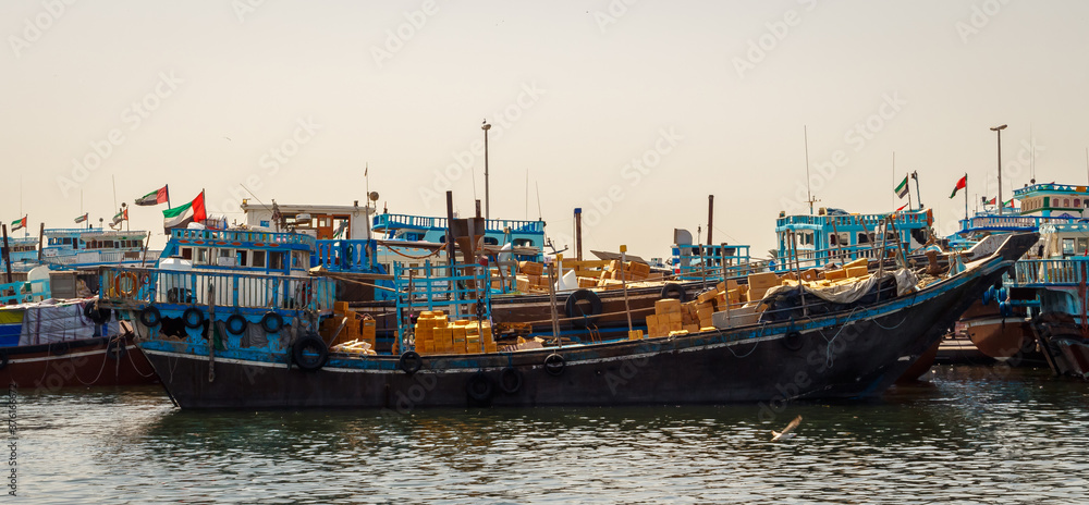 Cargo boats docked at Dubai Creek Harbor