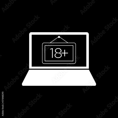 Laptop computer with 18 plus icon isolated on dark background