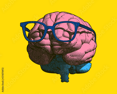 Brain with blue glasses drawing illustration on yellow BG
