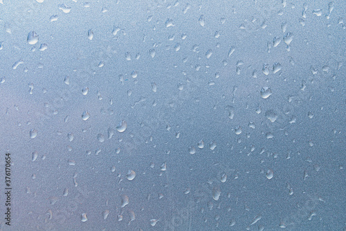 The water on the glass is an ancient abstract space background wallpaper for text.