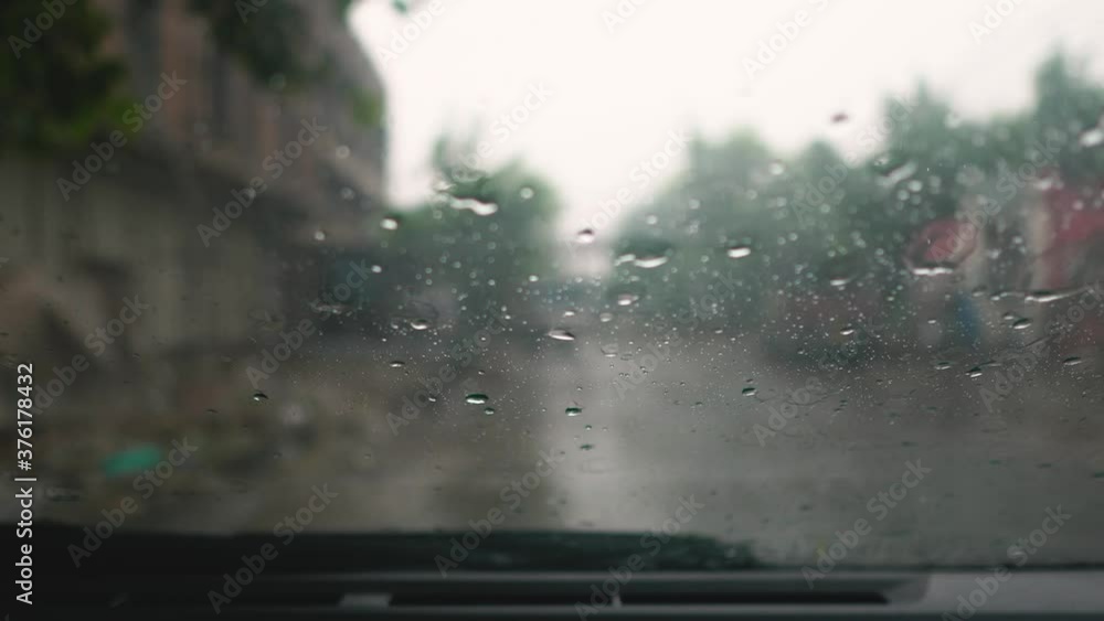 rain drops on the car windshield rain drops on the car windshield