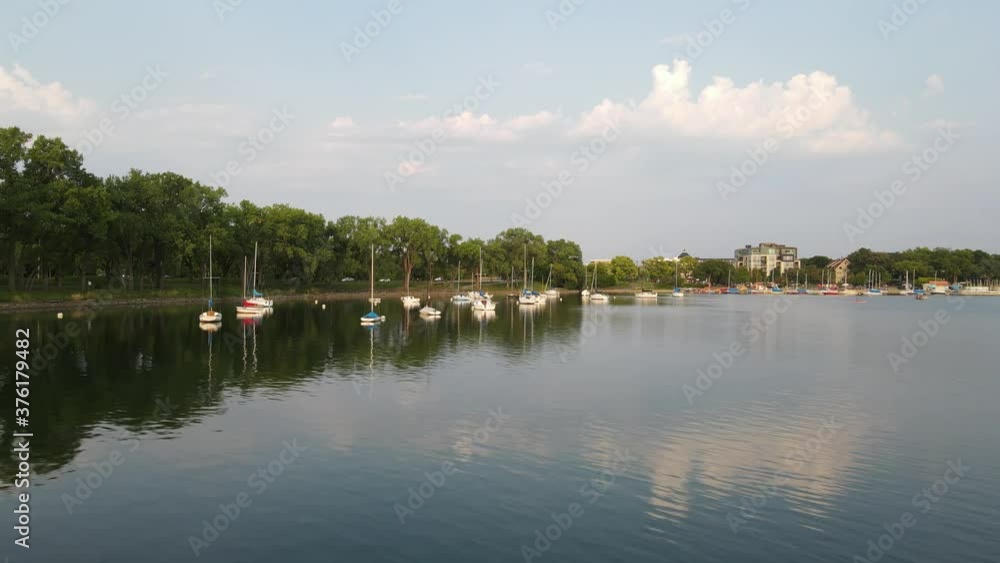 Boats at lake Bde Maka Ska in Minneapolis during summer time, Minnesota, United States Boats at lake Bde Maka Ska in Minneapolis during summer time, Minnesota, United States
