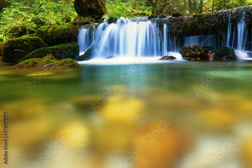 beautiful waterfall on Rachitele river in autumn