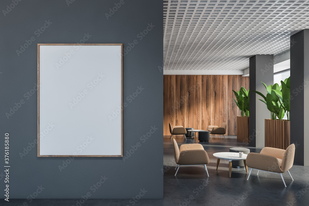 Gray and wooden office lounge with poster Gray and wooden office lounge with poster