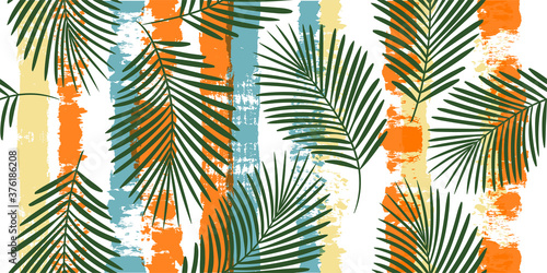 Tropical pattern, palm leaves seamless vector floral background. Exotic plant on colorful stripes print illustration. Summer nature jungle print. Leaves of palm tree on paint lines. ink brush strokes