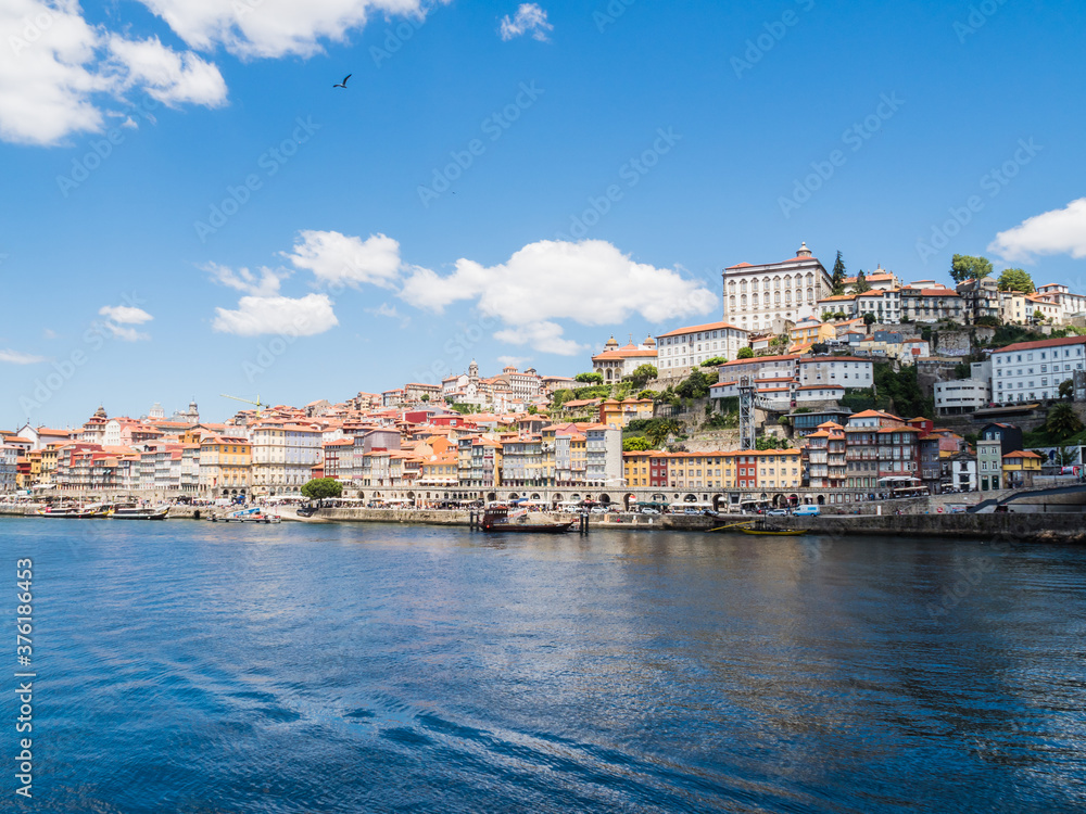 PORTO, PORTUGAL - JUNE 11, 2019: Ribeira neighborhood. It is the second-largest city in Portugal. It was proclaimed a World Heritage Site by UNESCO in 1996.