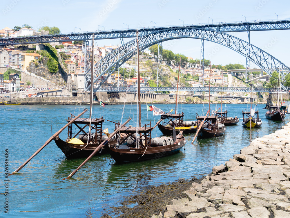 PORTO, PORTUGAL - JUNE 10, 2019: Luis I bridge and Douro river. It is the second-largest city in Portugal. It was proclaimed a World Heritage Site by UNESCO in 1996.